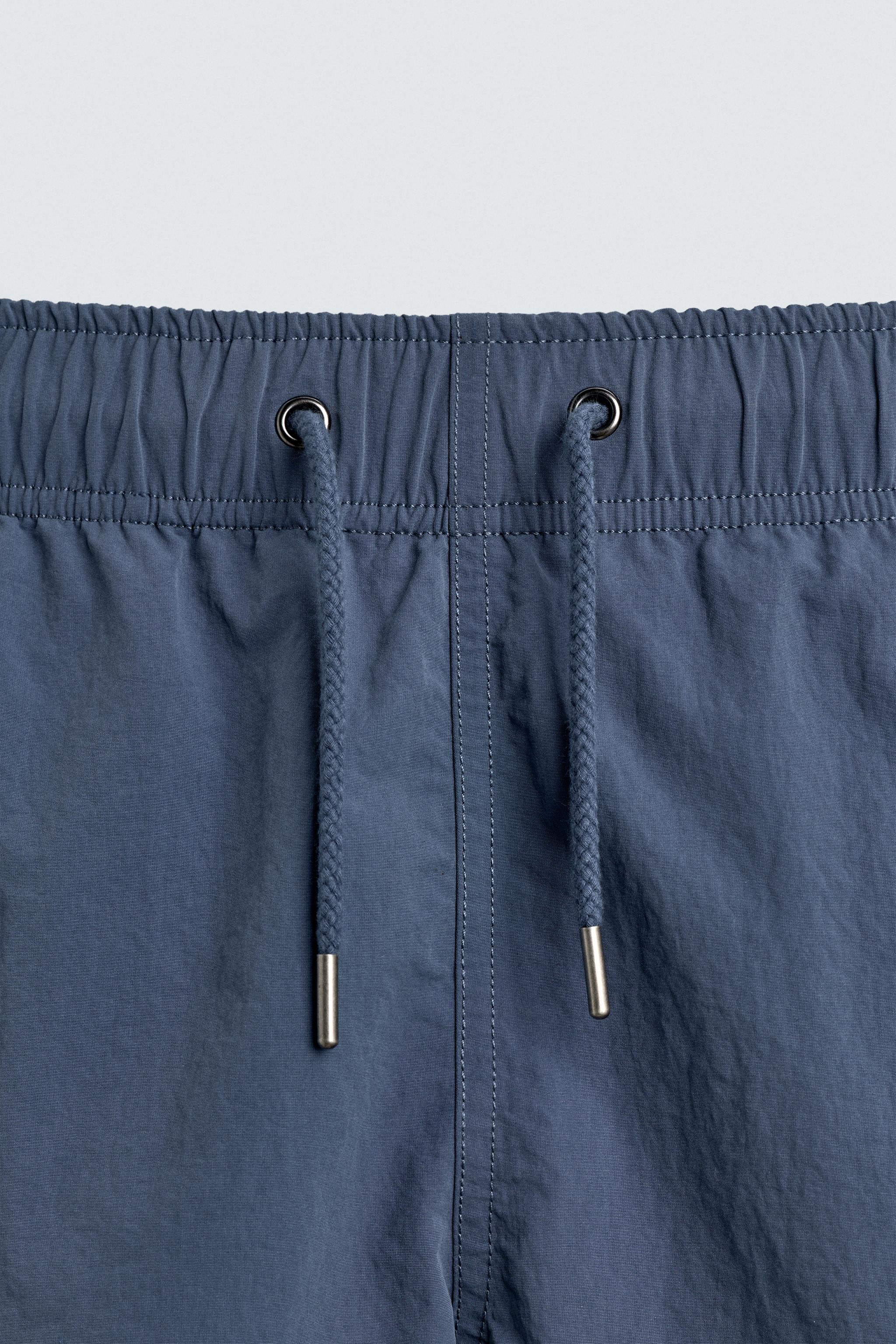 MAILLOT DE BAIN LONG TECHNIQUE